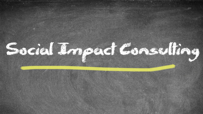 virtual chalkboard that reads "Social Impact Consulting" in white chalk font with a yellow line underneath the words
